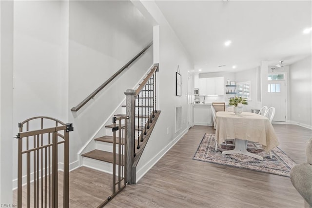 dining area featuring recessed lighting, visible vents, baseboards, and wood finished floors