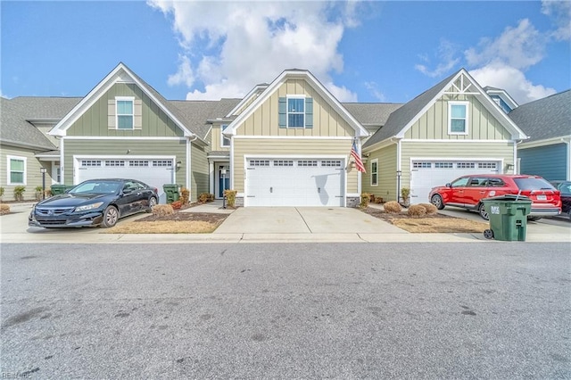 craftsman inspired home with board and batten siding and driveway