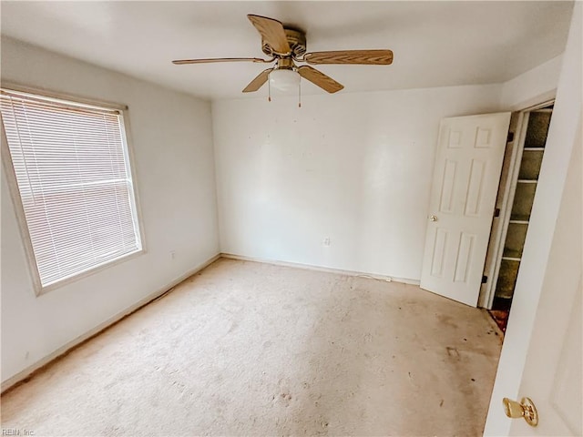 spare room with ceiling fan