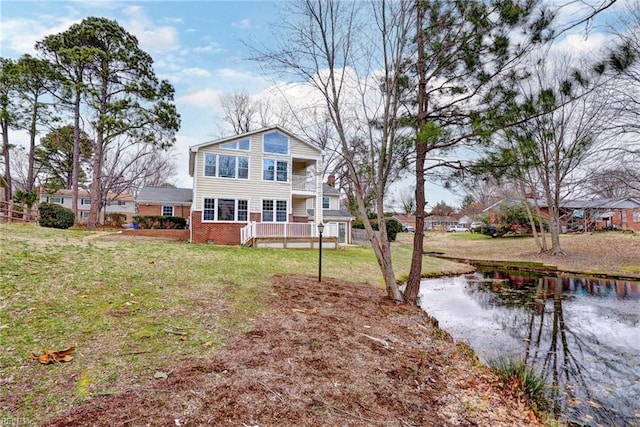 exterior space featuring crawl space, a lawn, and brick siding