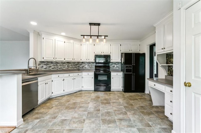 kitchen featuring white cabinets, black appliances, decorative backsplash, and a sink