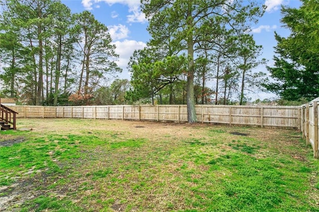 view of yard featuring a fenced backyard