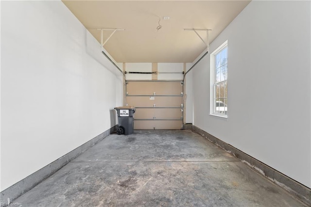 garage with baseboards