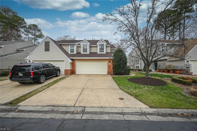 view of front of house featuring driveway, brick siding, and a shingled roof