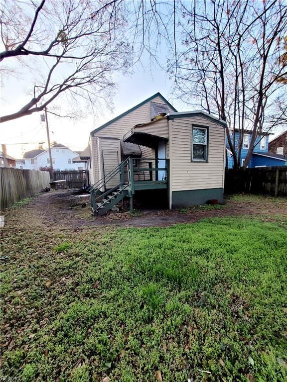 exterior space featuring a fenced backyard