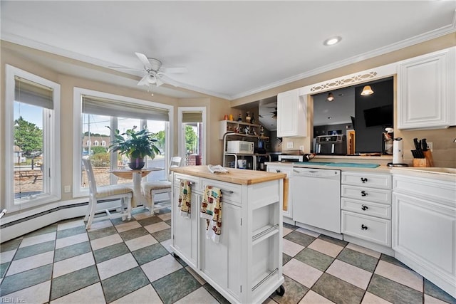 kitchen with a kitchen island, white cabinetry, crown molding, white dishwasher, and ceiling fan