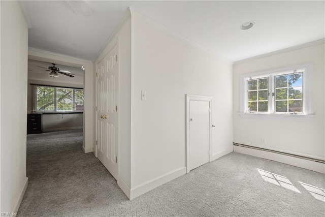 interior space with carpet, baseboards, and a baseboard radiator