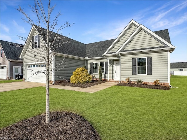 view of front of home with a garage, driveway, a front yard, and a shingled roof