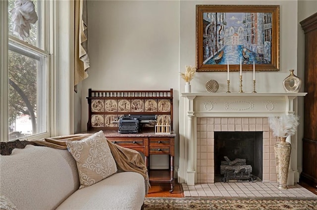 sitting room featuring a fireplace