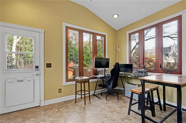 office with french doors, vaulted ceiling, and baseboards