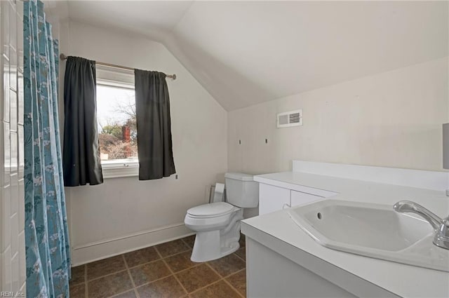 full bath with visible vents, toilet, vaulted ceiling, vanity, and baseboards