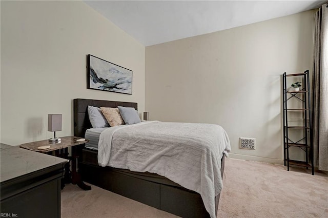 bedroom with light carpet and visible vents