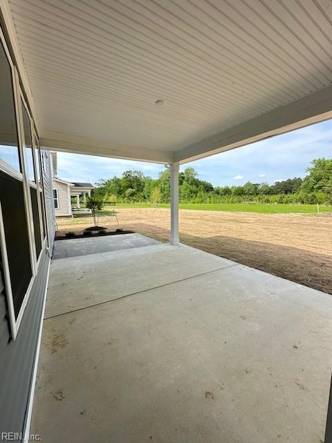 view of patio / terrace featuring a carport