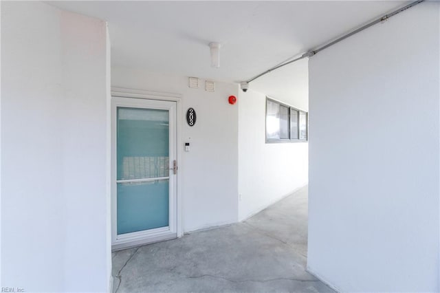 property entrance featuring stucco siding