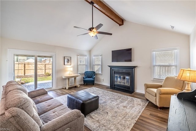 living room with dark wood-style floors, visible vents, a fireplace with flush hearth, beamed ceiling, and baseboards