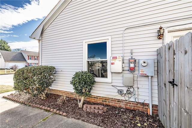 view of property exterior with fence