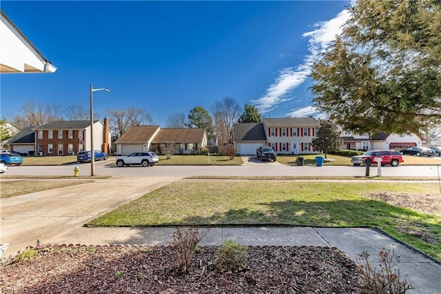 view of yard featuring a residential view