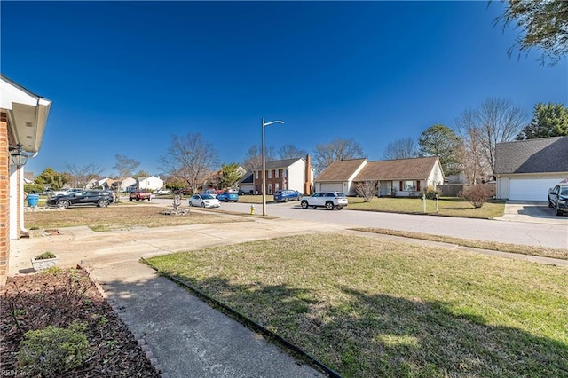 view of yard featuring a residential view