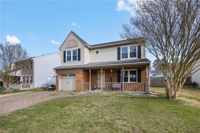 traditional home featuring covered porch, a garage, brick siding, decorative driveway, and a front yard