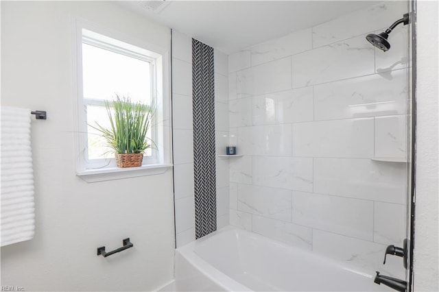 full bath with visible vents and shower / bathtub combination