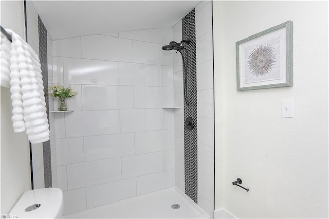 full bath with tiled shower