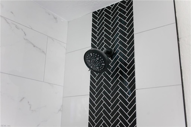 room details with a tile shower