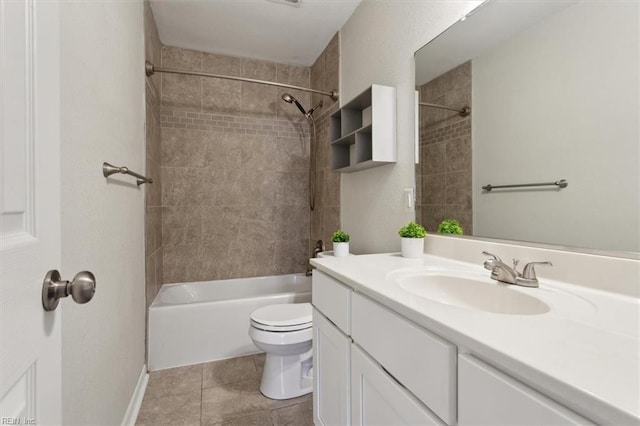 bathroom featuring tile patterned floors, toilet, bathtub / shower combination, and vanity