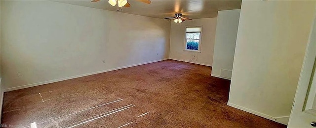 spare room featuring carpet floors, ceiling fan, and baseboards