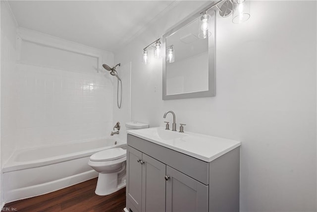 full bathroom with shower / bath combination, vanity, toilet, and wood finished floors