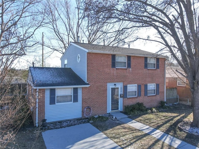 view of front of home with brick siding