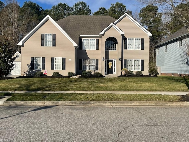 colonial-style house with a front yard