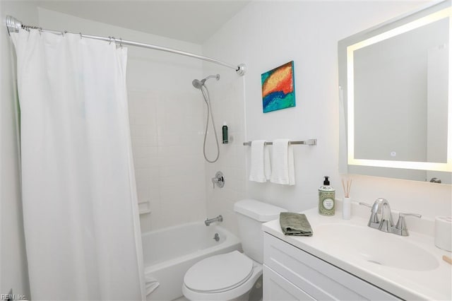 bathroom with shower / bath combo with shower curtain, toilet, and vanity