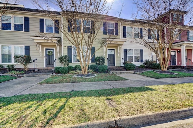 view of property featuring a front yard