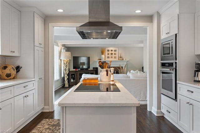 kitchen with dark wood finished floors, island exhaust hood, stainless steel appliances, open floor plan, and a center island