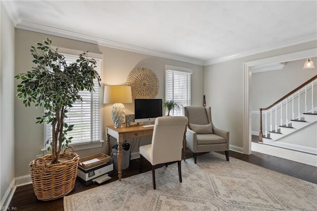 office space with a wealth of natural light, baseboards, and wood finished floors