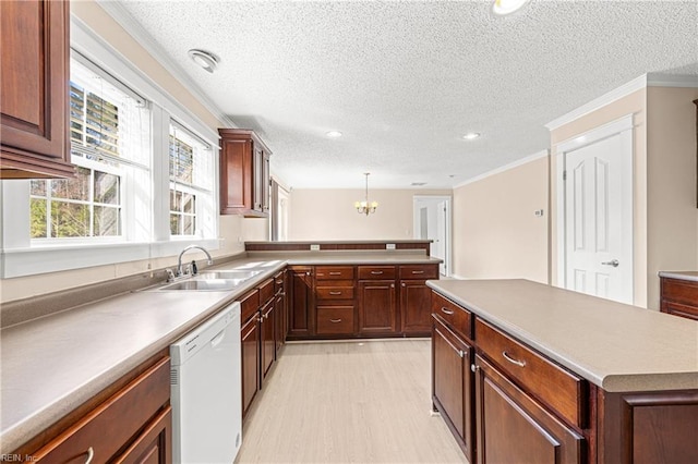 kitchen featuring an inviting chandelier, ornamental molding, a sink, dishwasher, and light wood-type flooring