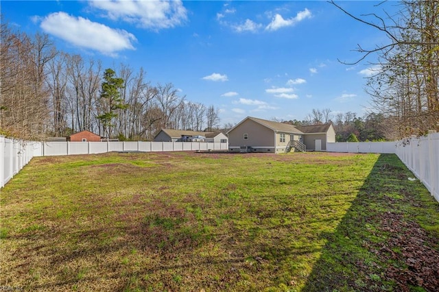 view of yard featuring a fenced backyard