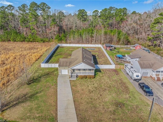 aerial view featuring a view of trees