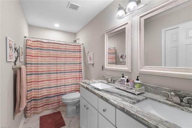 bathroom with a sink, visible vents, toilet, and marble finish floor