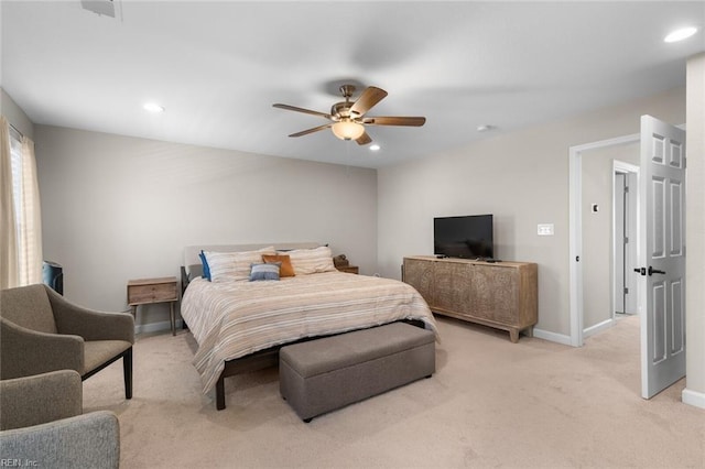 bedroom with ceiling fan, recessed lighting, baseboards, and light carpet