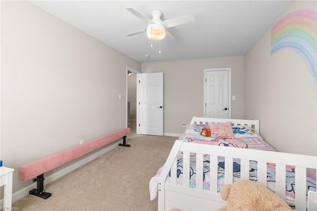 bedroom featuring baseboards, carpet, and a ceiling fan