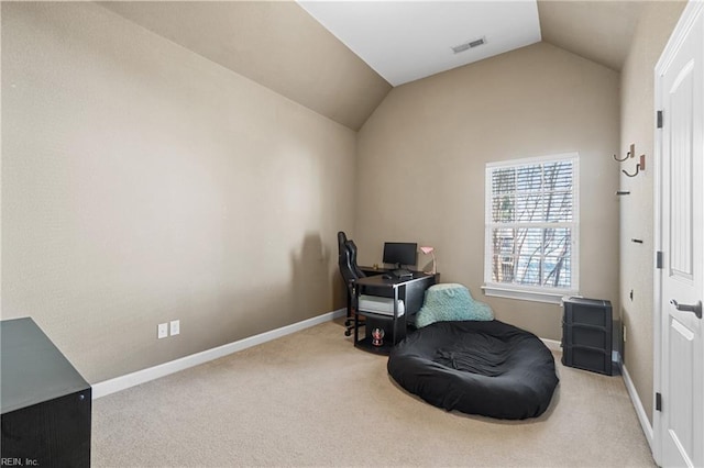 sitting room with visible vents, baseboards, carpet, and lofted ceiling