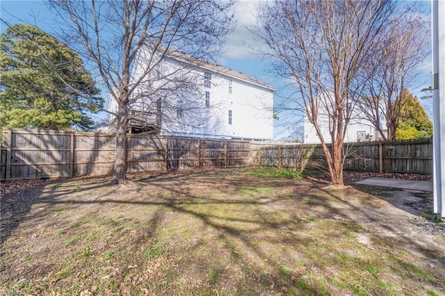 view of yard with a fenced backyard