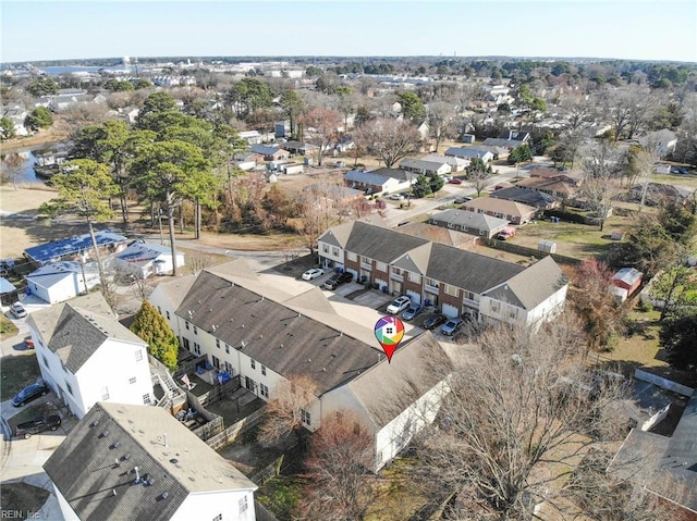 birds eye view of property with a residential view