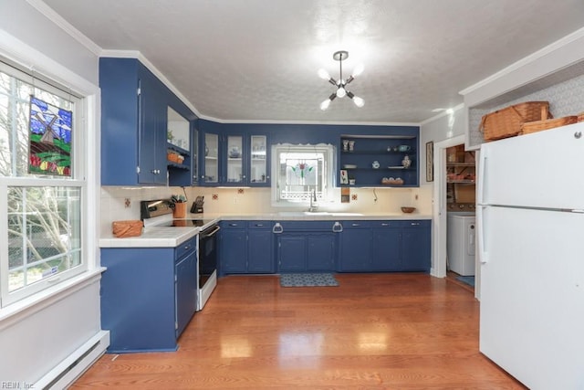 kitchen featuring baseboard heating, white appliances, blue cabinets, and open shelves