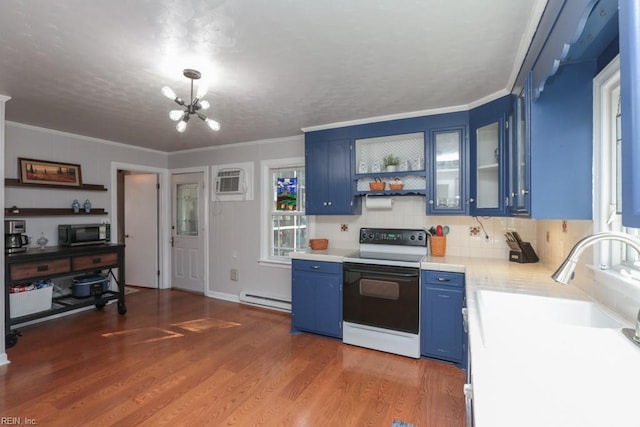 kitchen with blue cabinetry, a sink, electric range oven, a baseboard heating unit, and light wood-type flooring