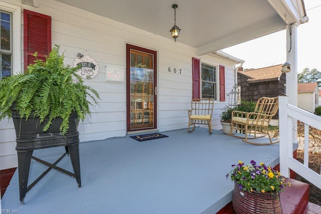 doorway to property with covered porch