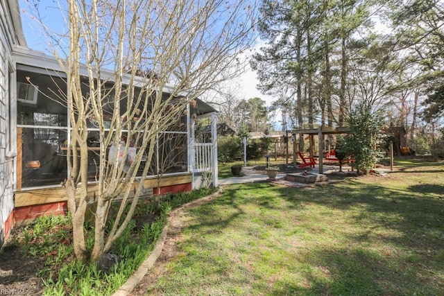 view of yard with a patio and a pergola