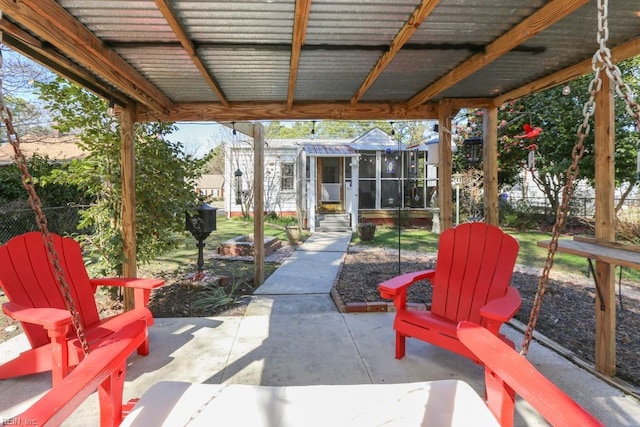 view of patio featuring fence