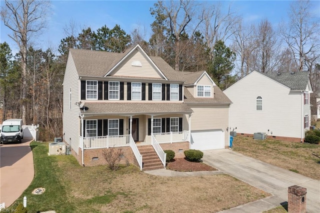 view of front of home featuring driveway, covered porch, a shingled roof, a garage, and crawl space